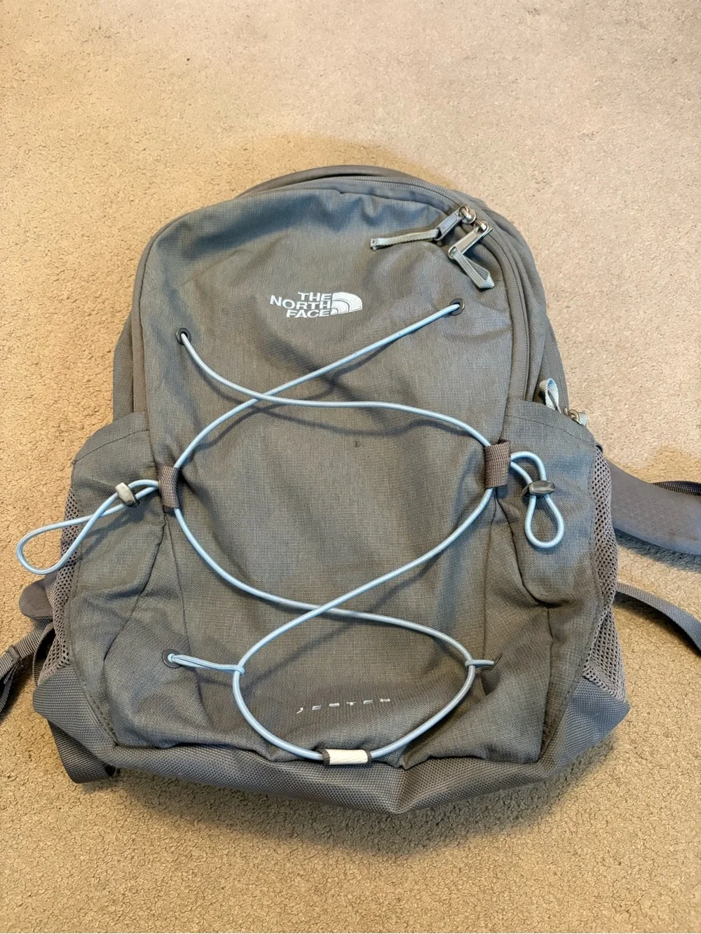 The North Face Gray Women’s Backpack with Light Blue Bungee